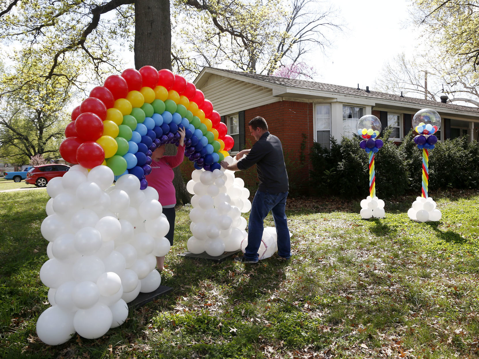 Look for the helpers: Balloon artists
